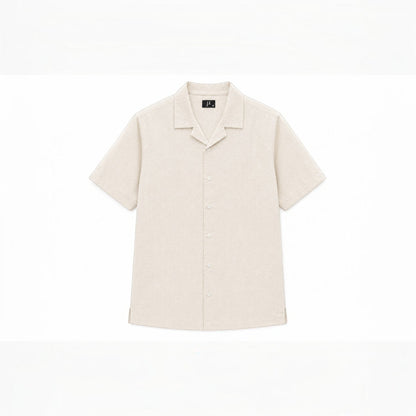 MU SHOP beige linen short-sleeve shirt with a relaxed fit and soft collar.