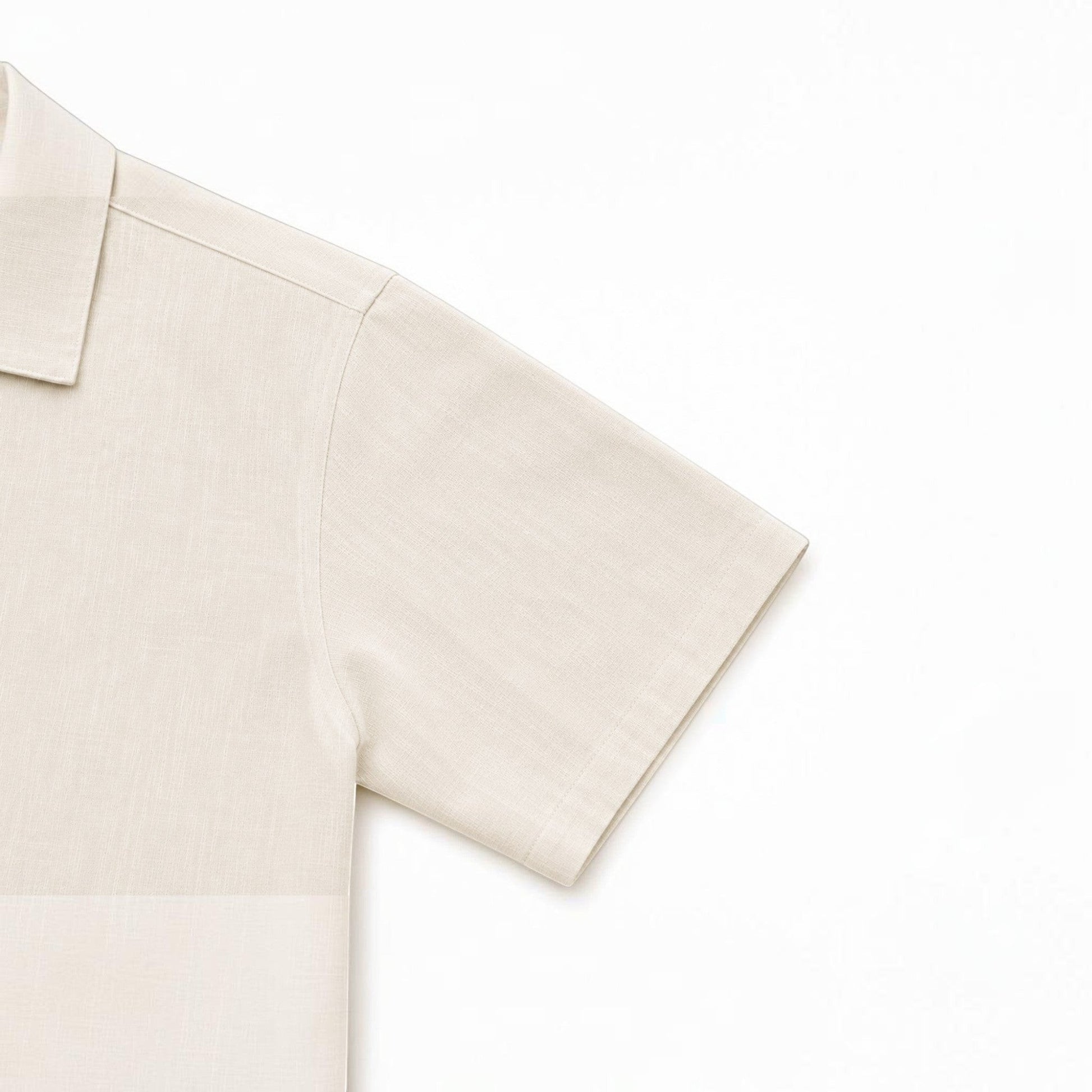 MU SHOP beige linen short-sleeve shirt with a soft collar and relaxed fit.