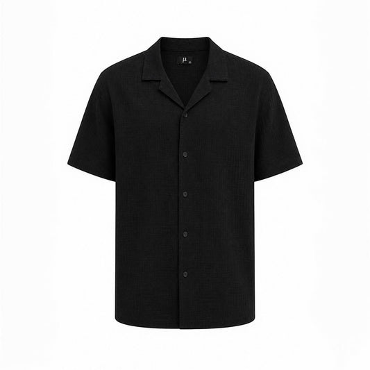 MU SHOP black linen short-sleeve shirt with a relaxed tailored fit and soft structured collar.
