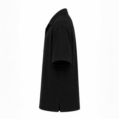 MU SHOP black linen short-sleeve shirt with a soft structured collar and matte buttons. Relaxed fit.