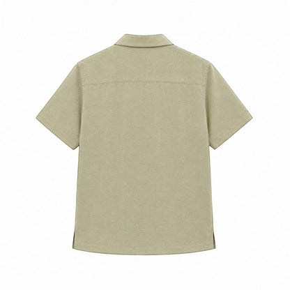 MU SHOP olive green 100% linen short-sleeve shirt with a relaxed fit and rounded hem.
