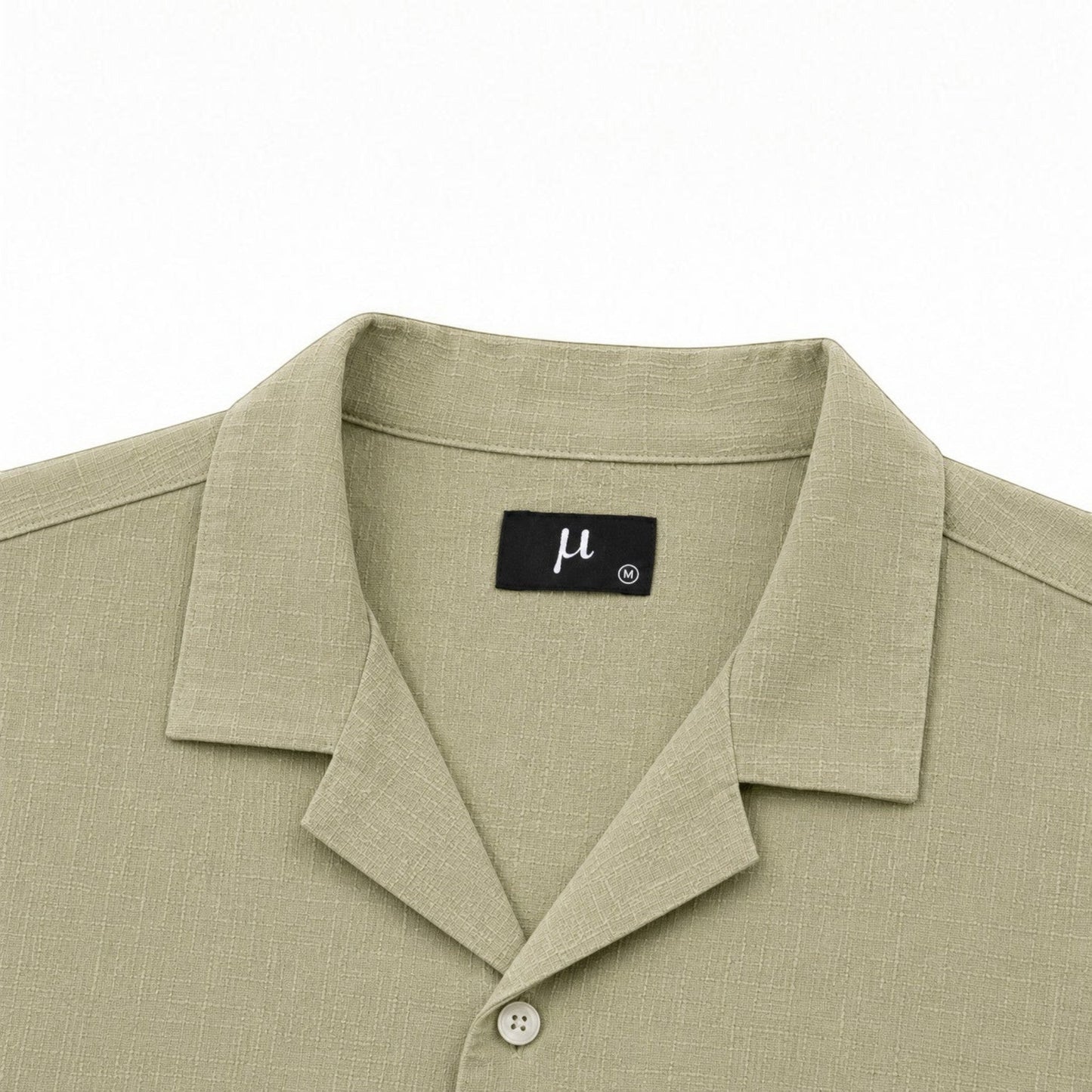 MU SHOP olive green 100% linen short-sleeve shirt with a relaxed fit and spread collar.