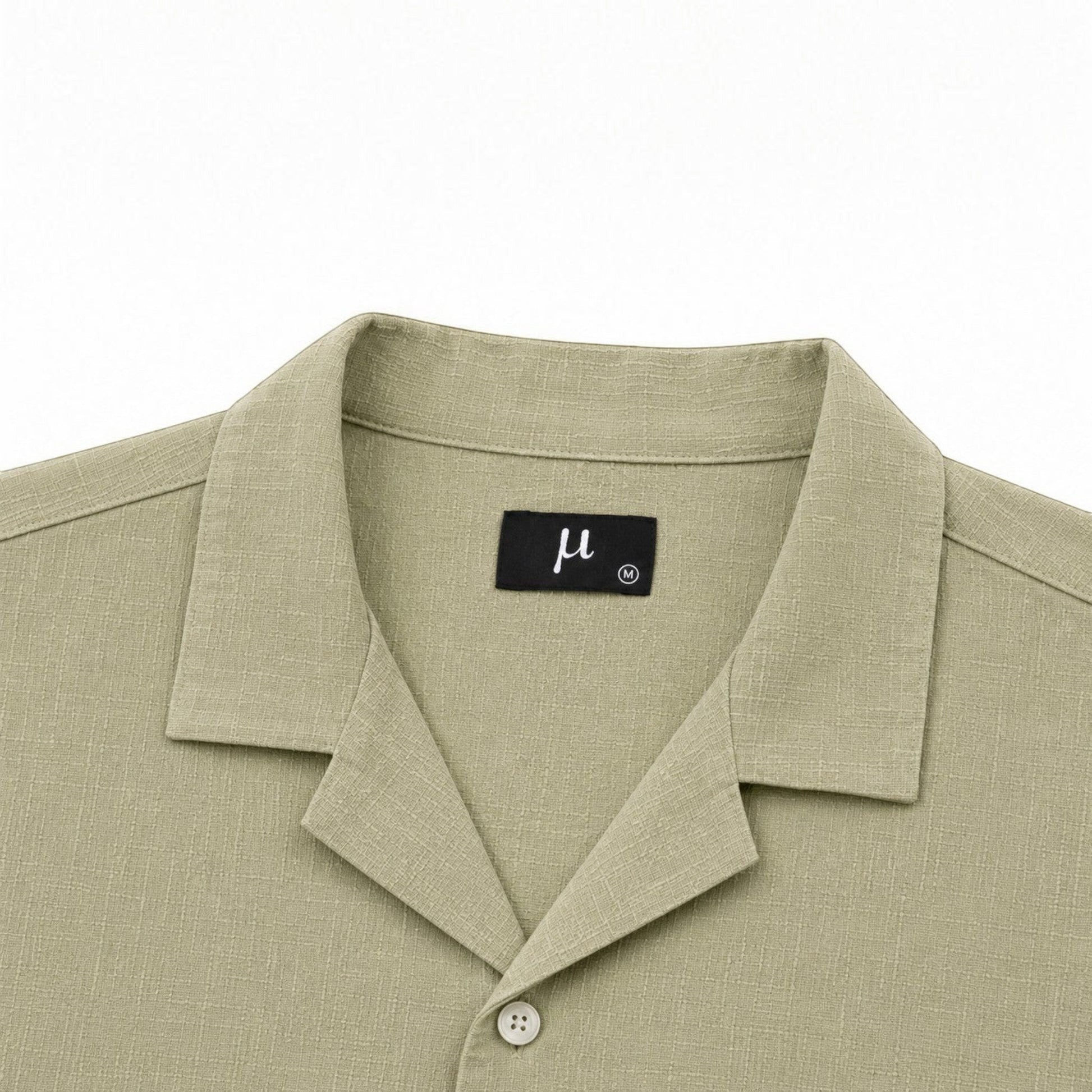 MU SHOP olive green 100% linen short-sleeve shirt with a relaxed fit and spread collar.