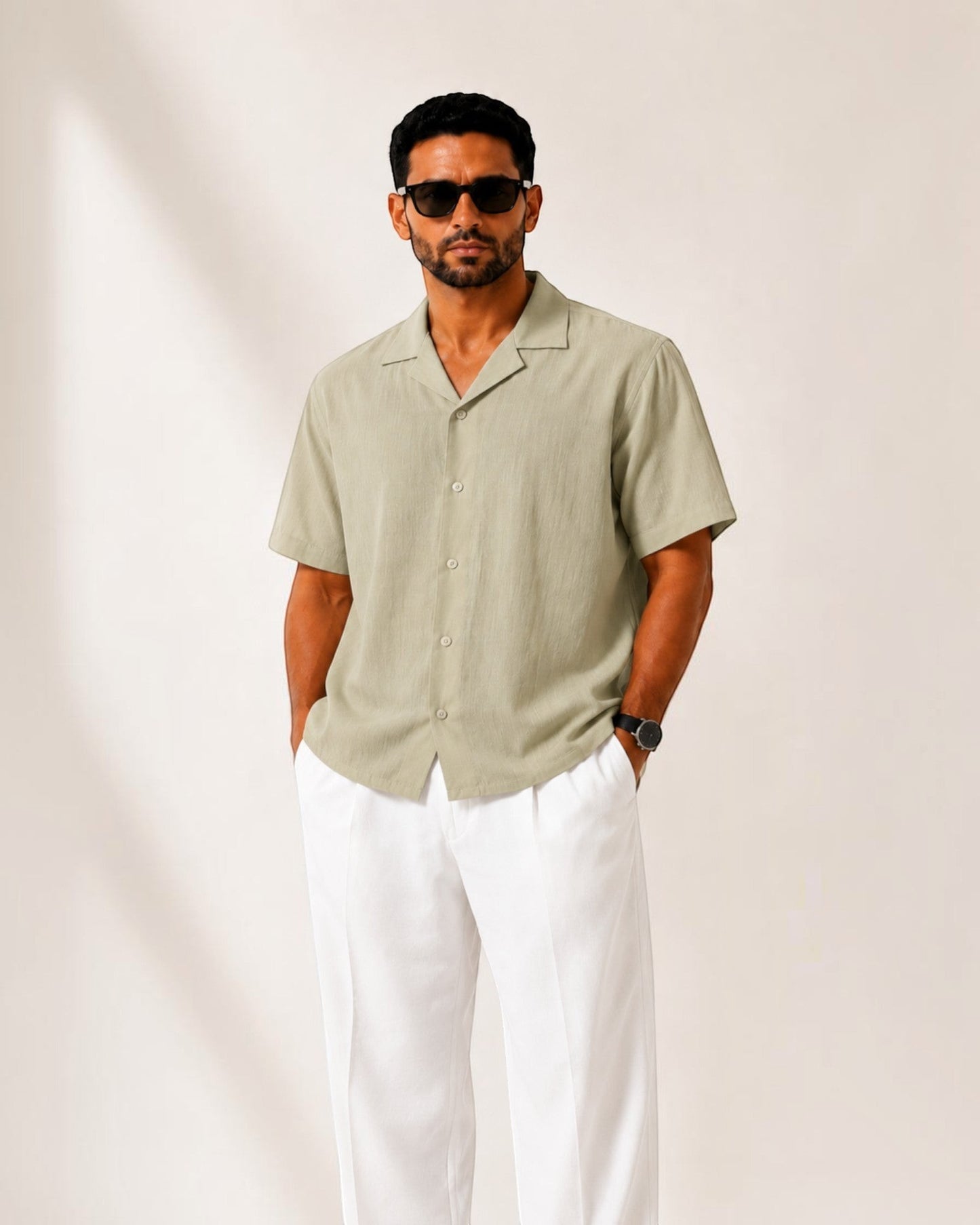 MU SHOP Men's Sun-Washed Olive 100% Linen Short-Sleeve Shirt with camp collar and rounded hem.