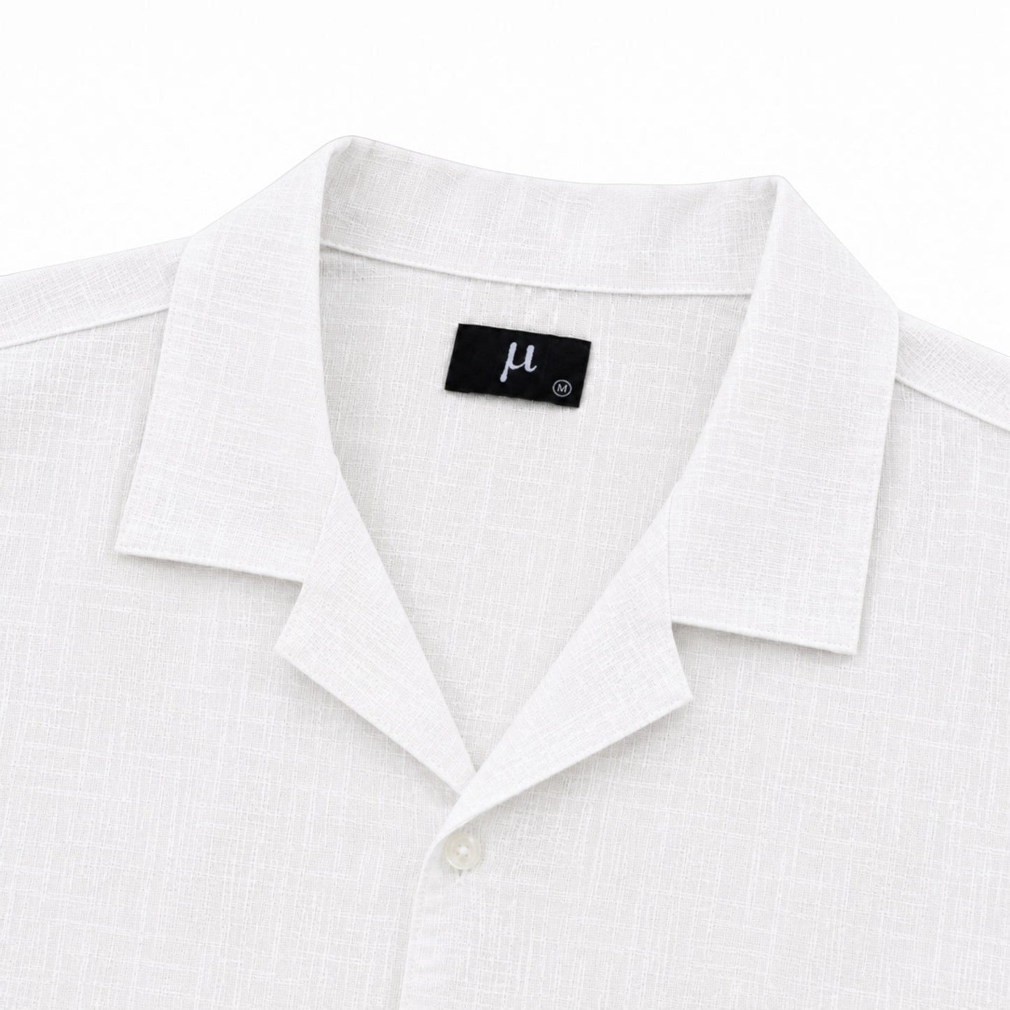 MU SHOP white linen shirt with a soft structured collar and relaxed fit. Premium breathable fabric.