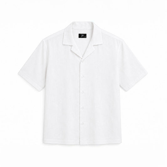 MU SHOP white linen short-sleeve shirt with a relaxed fit and open collar, perfect for summer.